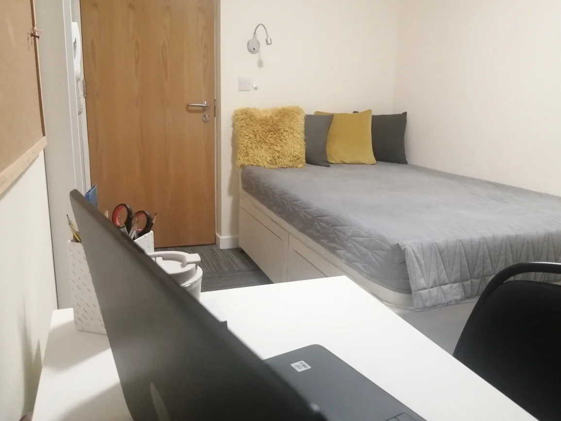 An en-suite bedroom, with the shower room opening directly off it
